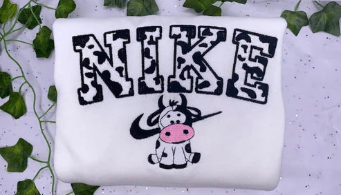 Nike cow print crew neck sale