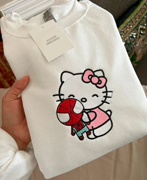 Hello Kitty Hugging Spiderman - embroidered sweatshirt